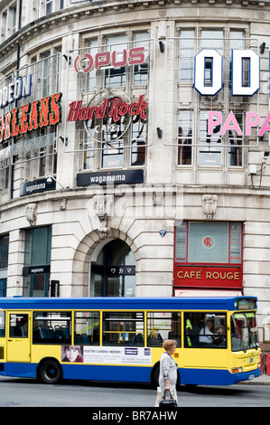 Bus in front of the Printworks building in Manchester city centre, England, UK Stock Photo