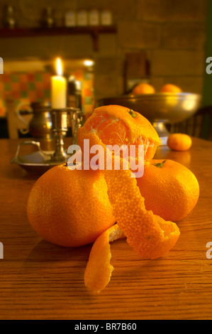 Clementines in a rustic country kitchen setting Stock Photo