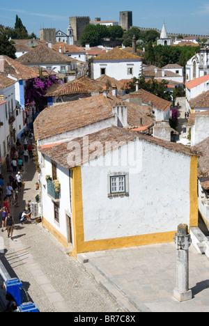 The mediaeval fortified city of Obidos, Portugal. Rua Direita street. Stock Photo