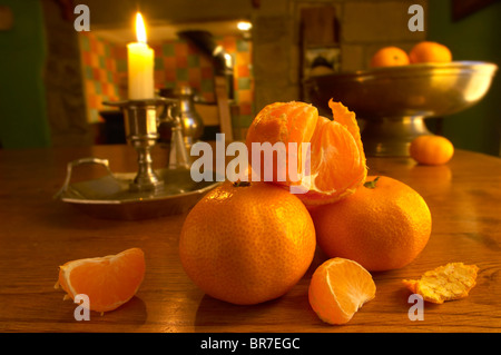 Clementines in a rustic country kitchen setting Stock Photo