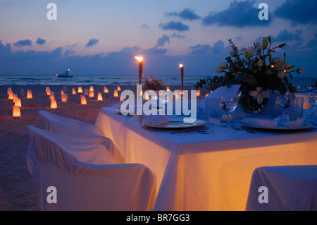 wedding reception tables with candlelight on Isla Mujeres Mexico Stock Photo