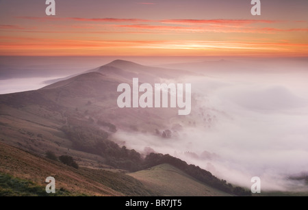 Losehill Pike and Back Tor from Mam Tor with mist inversion over The Hope Valley at Castleton in The Derbyshire Peak District UK Stock Photo