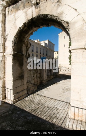 The roman Porte Auguste (August gate). Nimes, Languedoc-Roussillon, France Stock Photo