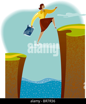 A woman jumping over a crevasse Stock Photo