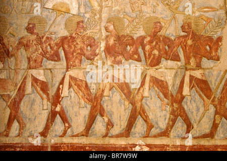 Painted relief on wall of Deir el Bahri, West Bank, Luxor, Egypt Stock Photo