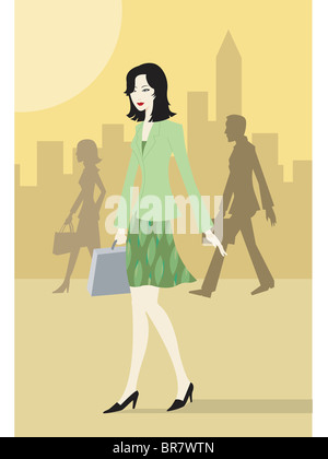 Businesswoman with briefcase walking in the city Stock Photo
