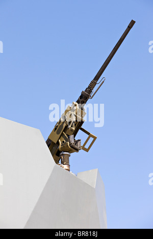 Heavy machine gun mounted on a ship Stock Photo