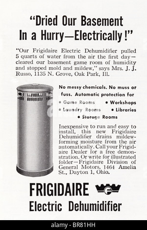 Black and white American magazine advert for Frigidaire Electric Dehumidifier circa 1950 Stock Photo