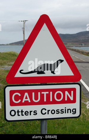 ‘Otters Crossing’ road sign at causeway from Eriskay to South Uist in the Outer Hebrides, Scotland Stock Photo