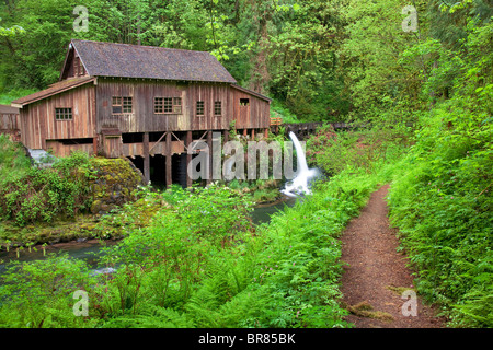 Cedar Creek Grist Mill in spring with path. Woodland, Washington Stock Photo