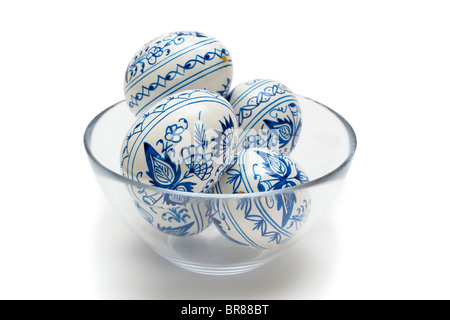 Painted blue and white traditional Easter eggs in a glass bowl Stock Photo