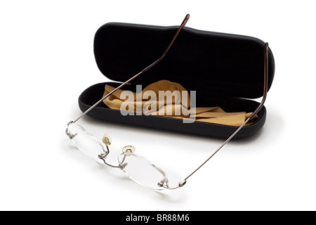A pair of reading glasses with open case and cleaning cloth Stock Photo
