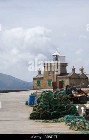 Blacksod pier with blacksod lighthouse in the background, The Erris Peninsula, Co. Mayo, Ireland Stock Photo