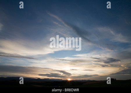 Sunrise over mountain range Stock Photo