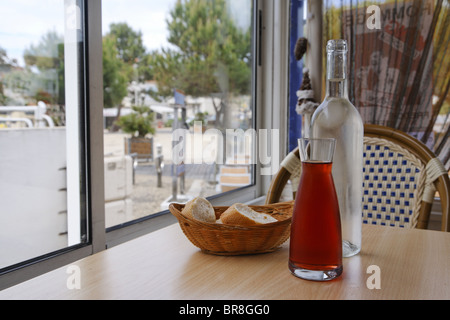 Red Wine in Decanter on Table Stock Photo