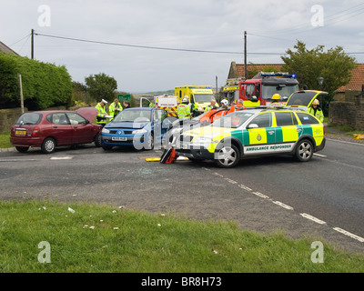 Emergency services work to rescue people from a multiple car crash Stock Photo
