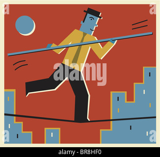 A man walking on a tight rope Stock Photo