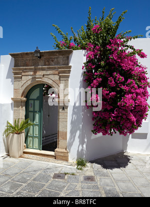 Flower Pots Outside Classic Villa  In Lindos Rhodes Greek Islands Greece Hellas Stock Photo