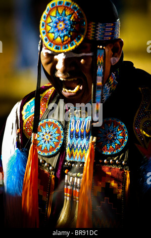 A Native American man participates in a dance at a powwow in Mesa Verde Colorado. Stock Photo