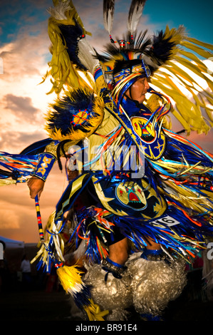 A Native American man participates in a dance at a powwow in Mesa Verde Colorado. Stock Photo