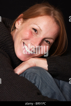 English Woman with natural red hair and freckles smiling Stock Photo