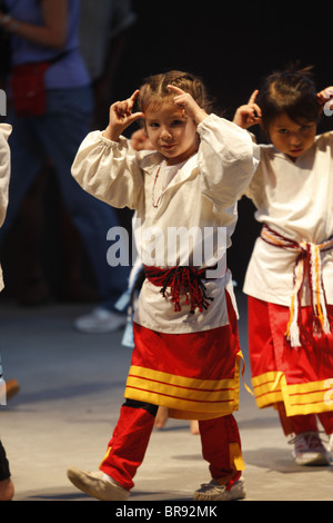 Cherokee, North Carolina -  Young girlsw performing an Ant Dance during the annual Southeast Tribes Festival. Stock Photo