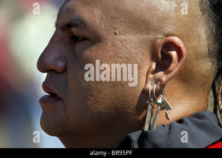 Headshot of a Cherokee man, member of the Warriors of AniKituhwa group, taking part in the annual Southeast Tribes Festival. Stock Photo