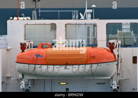 The lifeboat of the ferry ship Tenacia (Grandi Navi Veloci) from Palermo View from the side. Close up Stock Photo