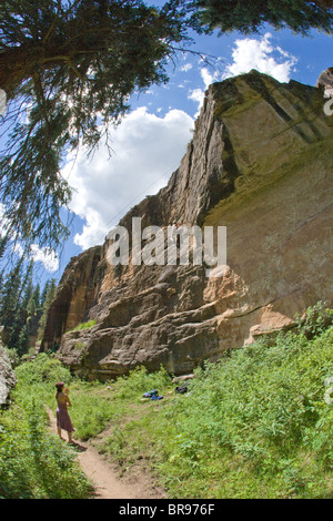 woman watching a rock climber in Southern Colorado, USA Stock Photo