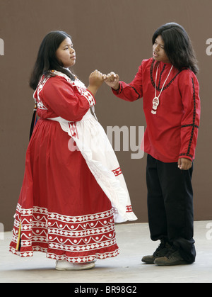 A couple of young Chactaw Indians performing a Wedding Dance during the annual Southeast Tribes Festival. Stock Photo