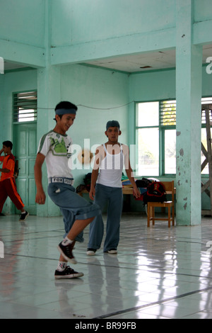 Students from Maninjau village school during physical education lesson. Stock Photo