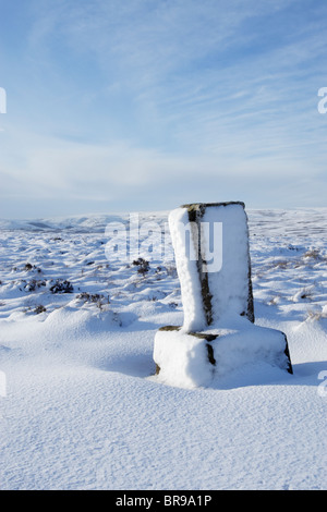 Commondale White Cross on a snow covered Commondale Moor during winter in North York Moors national park Stock Photo