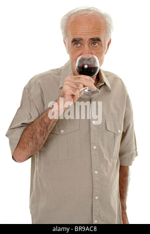 Elderly man drinking a glass of red wine Stock Photo