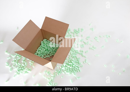 packing peanuts in cardboard box Stock Photo
