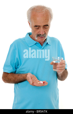 Senior taking medication Stock Photo