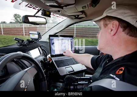 Storm Chaser David Drummond monitors a developing severe storm in northern Oklahoma, May 12, 2010. Stock Photo