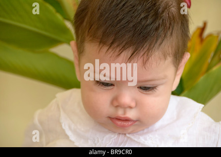 Merida, Yucatan/Mexico-July 8: Close up potrait of baby boy during his baptism celebration. Stock Photo