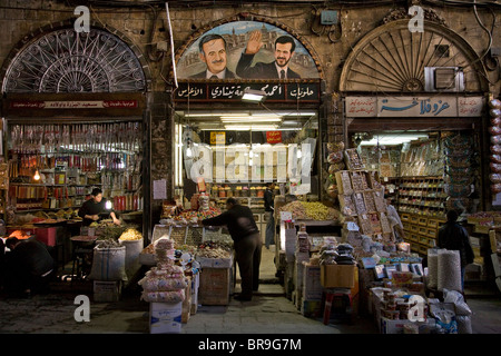 Painting of Basil and Hafez al-Assad in the Souk in Damascus Syria. Stock Photo