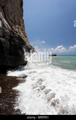 Waves and rocks. Petra Tou Romiou (near Paphos), birthplace of Aphrodite. Cyprus. Stock Photo