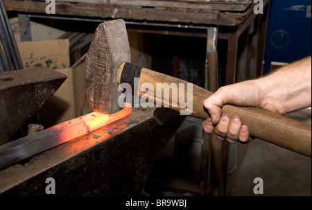 hands of the smith by the work Stock Photo