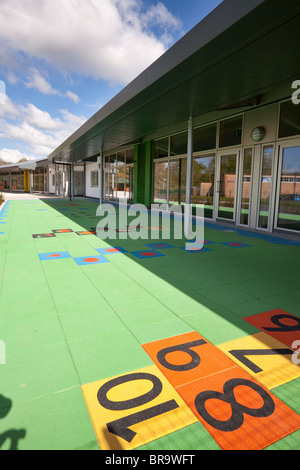 hopscotch markings on unoccupied school playground Stock Photo