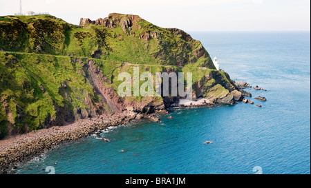 Hartland Point and lighthouse North Devon marking the transition between Bristol Channel and Atlantic Ocean Stock Photo