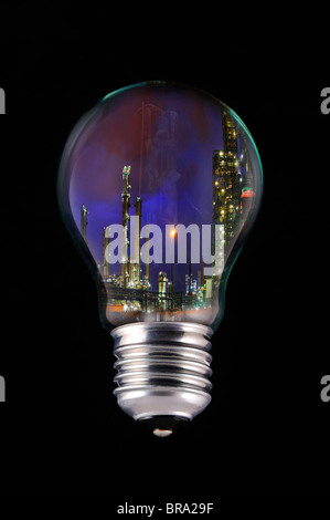 Lightning during thunderstorm above petrochemical industry inside incandescent lamp / bulb against black background Stock Photo