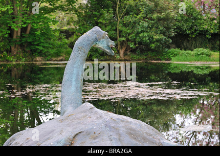 Reconstruction of Nessie, the Loch Ness monster, as a plesiosaur in pond outside the Loch Ness Exhibition Centre, Drumnadrochit Stock Photo