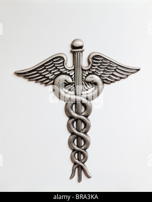 CADUCEUS HERMES WINGED STAFF TWINED SERPENTS ON WOODEN BACKGROUND NOW ...