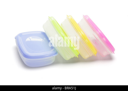 Four plastic storage containers on white background Stock Photo