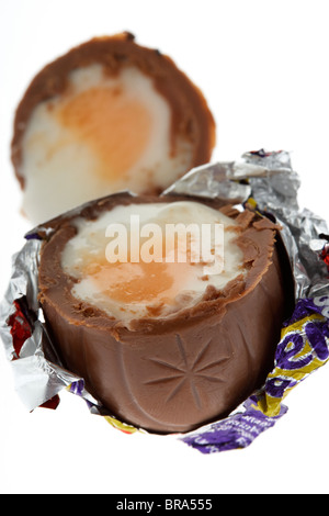 unwrapped sliced cadburys creme egg Stock Photo