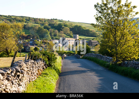 Evening light in Dentdale in the Yorkshire Dales National Park on the village of Dent, Cumbria Stock Photo