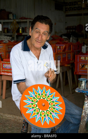 Carretas are elaborately painted oxcarts in the city of Sarchi Norte, Cosat Rica. This view is a detail of a wheel. Stock Photo