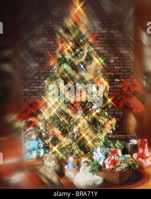 CHRISTMAS TREE WITH DEOCRATONS GARLAND LIGHTS TOYS AND PRESENTS UNDER TREE BLURRED EFFECT Stock Photo